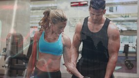 Animation of interface processing data over caucasian woman and male fitness trainer in gym. Sport, fitness, technology and digital interface concept digitally generated video.