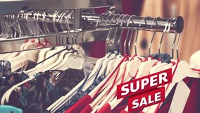 Best offer sale upto 50% off animation. A video for advertisement ,mid summer sale upto 50% off. Close-up clothes store in the Mall. Clothes in the hanger.