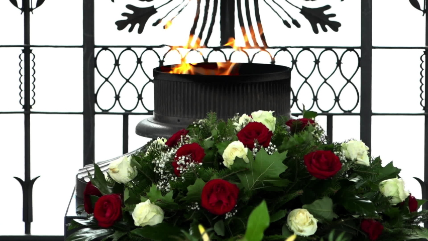 Cross of the military order Virtuti Militari at the eternal flame at the Tomb of the Unknown Soldier. Guard of honor at Piłsudski Square in Warsaw. Poland.
