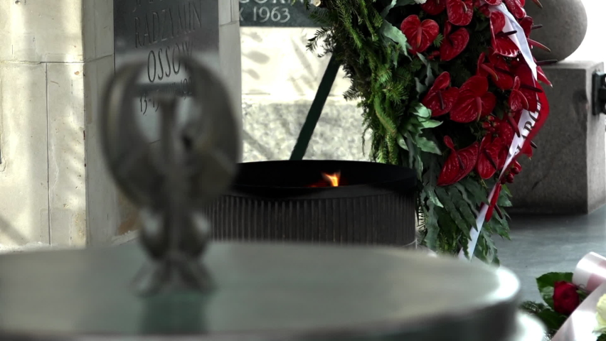 Eternal flame close-up at the Tomb of the Unknown Soldier in the capital of Poland, Warsaw. Monument on the square of Marshal Jozef. National symbol, symbolizing the greatest dedication.