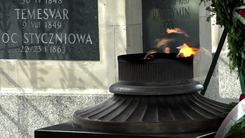 Eternal flame close-up at the Tomb of the Unknown Soldier in the capital of Poland, Warsaw. Monument on the square of Marshal Jozef. National symbol, symbolizing the greatest dedication.