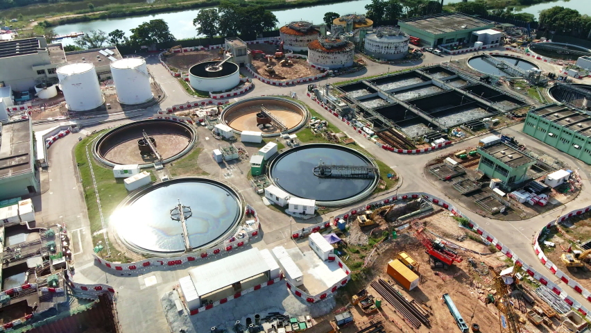 Wastewater treatment facility in Yuen Long, Hong Kong; aerial arc shot | Shutterstock HD Video #1093071917