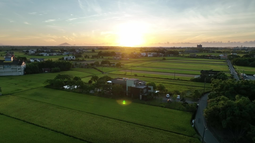 Aerial view of rural countryside with luxury houses during sunrise in Taiwan