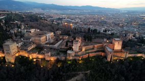 Alhambra palace in Granada, Spain, islamic medieval castle, aerial view of famous tourist landmark in Andalucia, southern Spain. High quality 4k footage