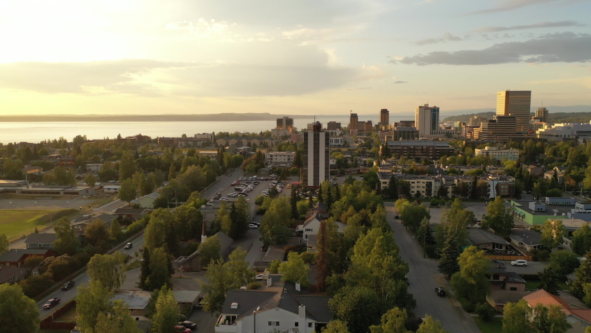 Aerial View of Anchorage, Alaska. Flying over Residential houses, downtown in the background. Establishing shot, Downtown, Skyline, cityscape