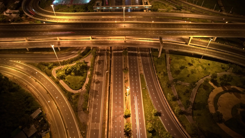 Stunning night aerial view drone shot above interchange and multi junction road. Night traffic time lapse. Hyperlapse. drone 4K. Thailand
 | Shutterstock HD Video #1093089531
