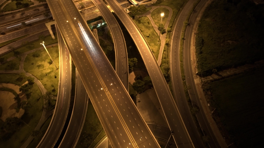 4K : Aerial view and top view of traffic on city. interchange and multi junction road with lots cars. Beautiful aerial top view from drone. Night traffic time lapse. Thailand.
 | Shutterstock HD Video #1093089537