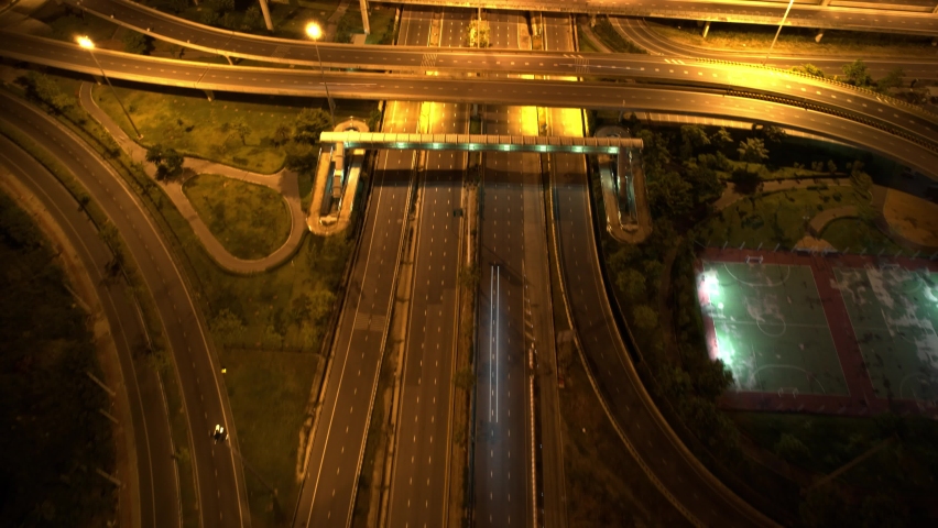 4K : Top view of interchange and multi junction road. The Intersection freeway road overpass the eastern outer ring road. Night traffic time lapse. Urban cityscape concept. hyperlapse
 | Shutterstock HD Video #1093089545