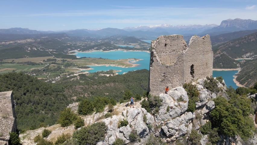 4k video made with a drone over the ruins of the castle of Samitier in the province of Huesca and municipality of Ainsa, in the Pyrenees of Aragon, from there there are impressive views of the Mediano | Shutterstock HD Video #1093095599