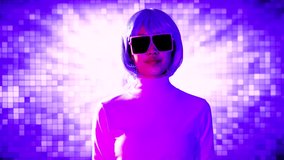 4K video of young asian woman silver and blue color short hair in white sweatshirt wearing vr sunglasses posing moving on the motion graphic blue and purple colr led background.