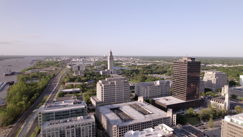 Aerial Shot Of Louisiana State Capitol In City, Drone Flying Forward On Sunny Day - Baton Rouge, Louisiana