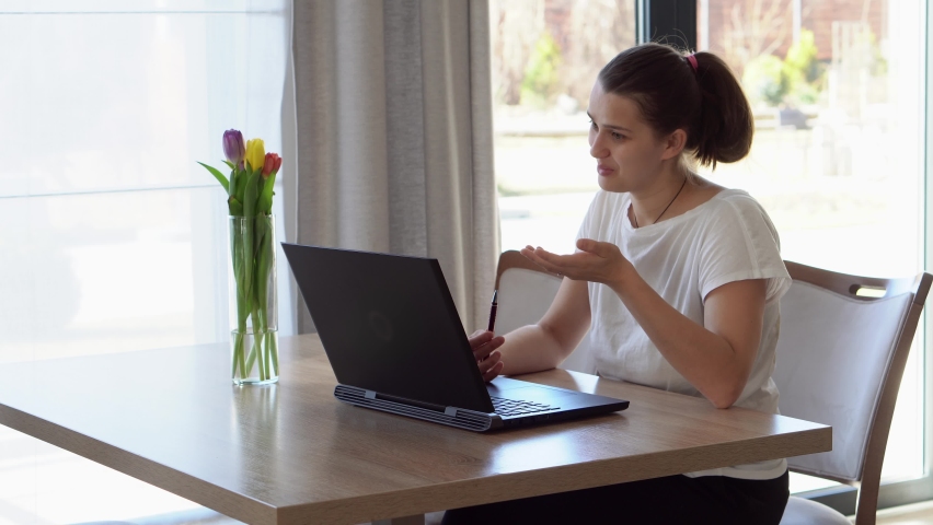 Authentic Caucasian Young Woman Chatting On Laptop At Home In Living Room. Writing Searching Using IT At Desk. Happy Lady Working On Computer Browsing Internet. Buisenes, Education, Technology Royalty-Free Stock Footage #1093122001