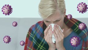 Animation of virus cell over sick caucasian woman having running nose. Health, medicine and covid 19 pandemic concept digitally generated video. - Powered by Shutterstock - Get 15% off with code: PIKWIZARD15