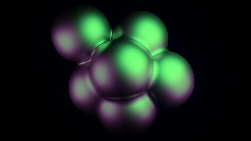 Abstract spheres of green and and purple spheres pulsating on a black background. Design. Glowing balls stick together and break apart. | Shutterstock HD Video #1093124607