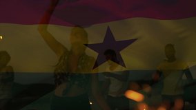 Animation of waving ghana flag over group of diverse friends on the beach. Travel, holidays, patriotism and celebration concept digitally generated video. - Powered by Shutterstock - Get 15% off with code: PIKWIZARD15