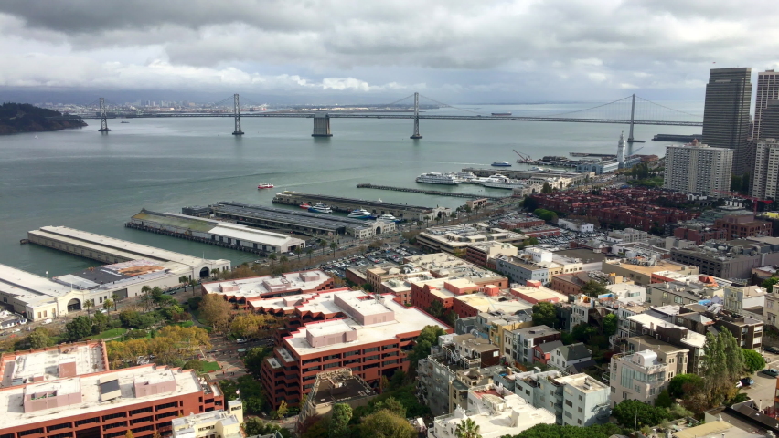 Aerial view Oakland Bay Bridge and Embarcadero on a cloudy day