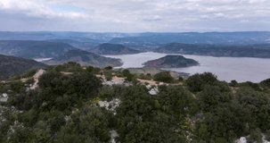 Aerial panorama of Lac du Slagou in the early morning in a windy spring 