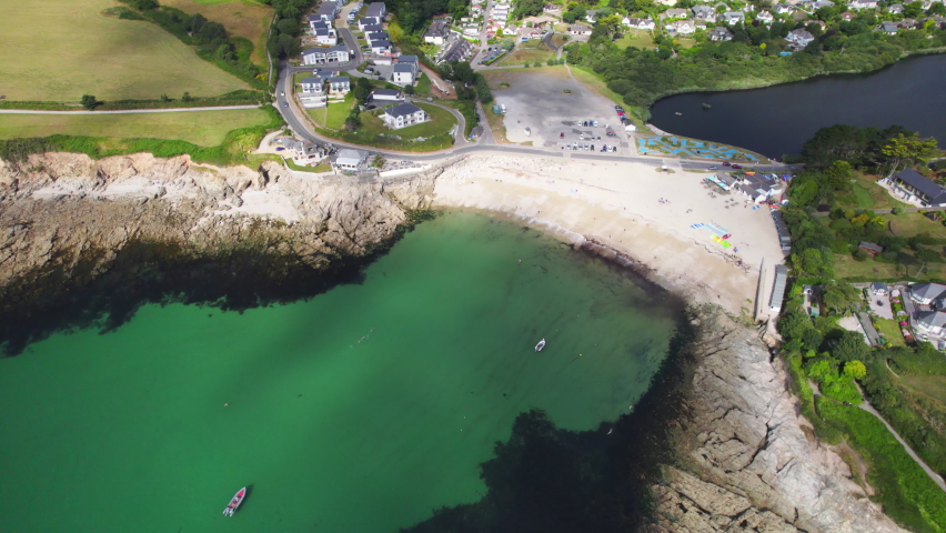 Aerial shot looking down on Swanpool beach in Falmouth , Cornwall, UK | Shutterstock HD Video #1093156721