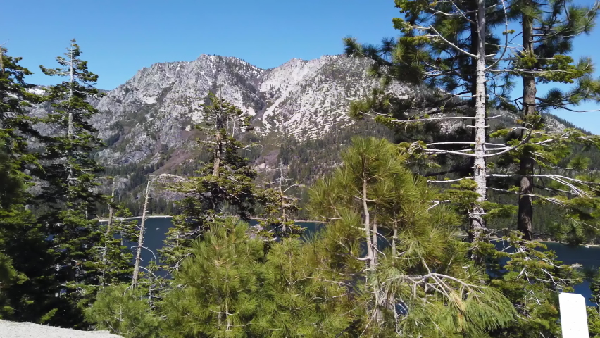 Driving by Lake Tahoe, Sierra Nevada USA on Sunny Day, Car Passenger POV