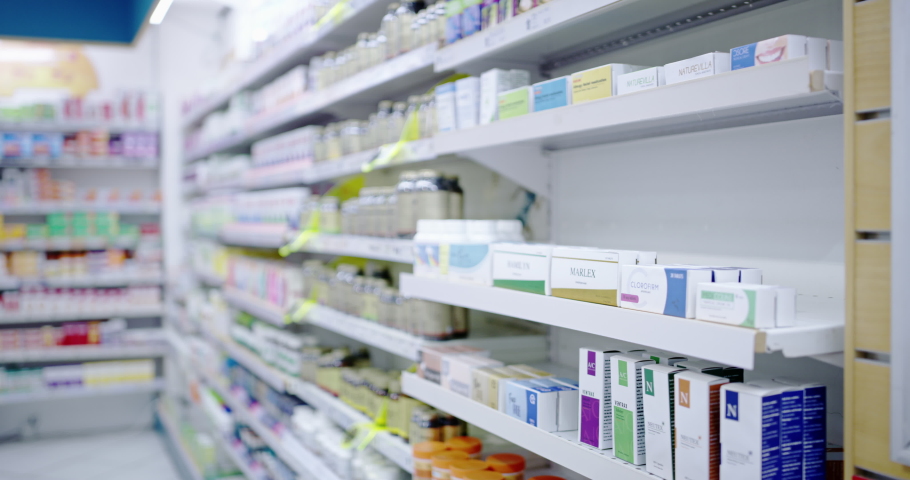 Pharmacy medicine, pills and drugs on shelf for treatment, cures and healing illness, sickness and disease. Closeup of variety of boxes, bottles and medication containers in drugstore stock for sale Royalty-Free Stock Footage #1093177003