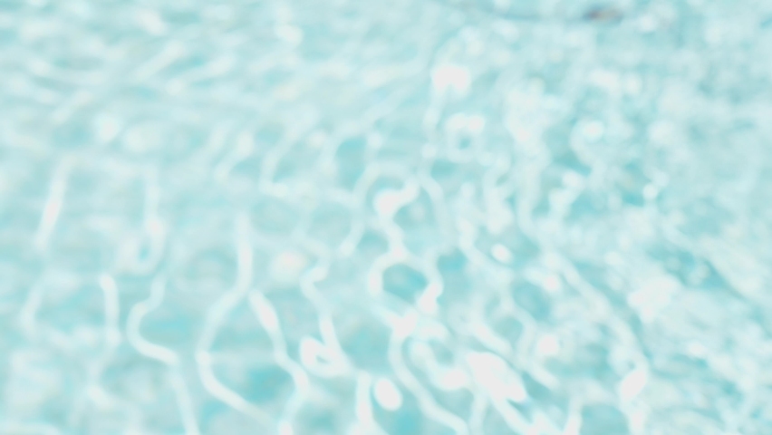 Beautiful abstract liquid blue and white colors gradient liquid 4k stock video background. Defocused burry sunny surface of water. Natural pastel organic bokeh backdrop