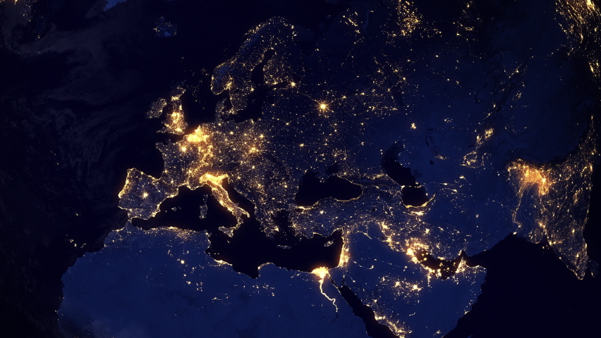 Animation of Rotating Earth From Europe to North America at night. Earth Seen from Space With City Lights Showing Human Activity. Satellite View.