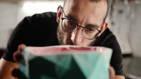 Artisan Man Artist Sculptor Blows Dust Stock Footage Video (100%