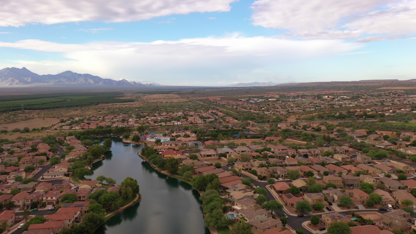 Arizona living, residential real estate community in Southern Arizona with aerial view of Santa Rita Mountains.