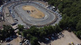 dynamic clip of cars racing around a race track