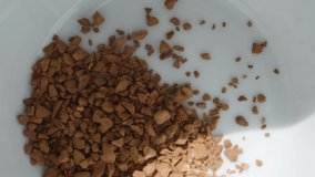 I pour instant coffee with hot water, a white mug, the camera fogs up. Dolly slider extreme close-up. - Powered by Shutterstock - Get 15% off with code: PIKWIZARD15