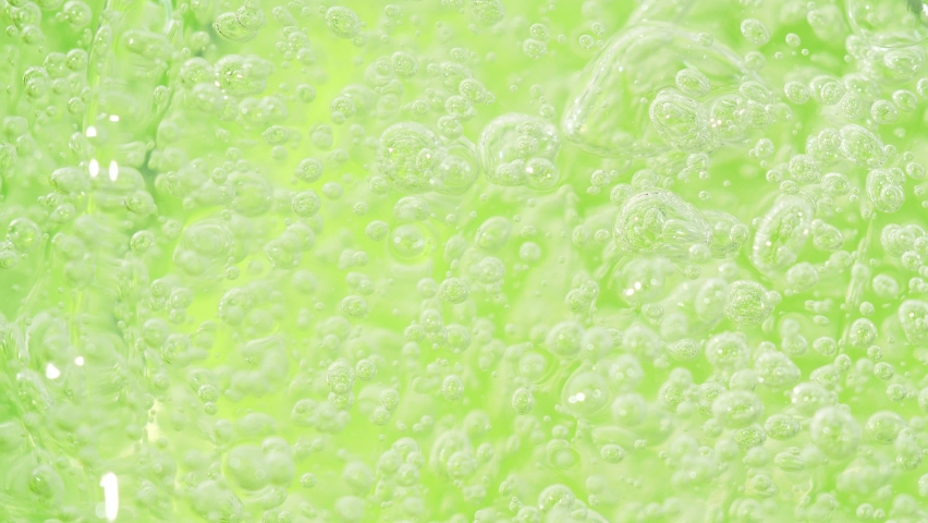 Green aloe vera cosmetic serum gel texture, transparent fluid, macro facial mask | Shutterstock HD Video #1093210921