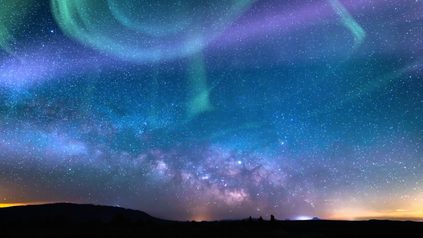 Aurora Purple Green and Milky Way Galaxy Over Iceberg Loop 14mm Royalty-Free Stock Footage #1093213989