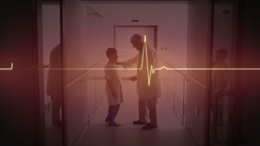 Animation of heart rate monitor over caucasian senior male doctor talking to a boy at hospital. Medical healthcare and technology concept | Shutterstock HD Video #1093217817
