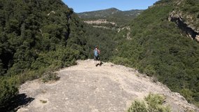 4k video made with a drone over the Confesionario waterfall and the Pozas de San Martin, near Boltaña in the Pyrenees of Aragon, in which we can see a landscape full of pine trees