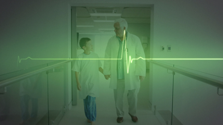 Animation of heart rate monitor over caucasian senior male doctor holding hands with boy at hospital. Medical healthcare and technology concept | Shutterstock HD Video #1093219623