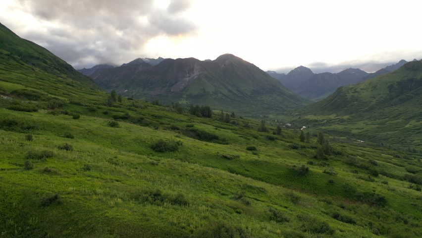 Aerial view of Hatcher Pass, Alaska. Mountains. pass through the Talkeetna Mountains from above. Summer Alaskan landscape 