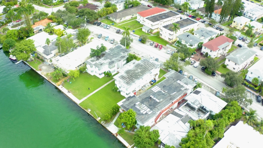 Aerial shot of a neighborhood on the edge of a river in Miami, Florida shot for a boat party video