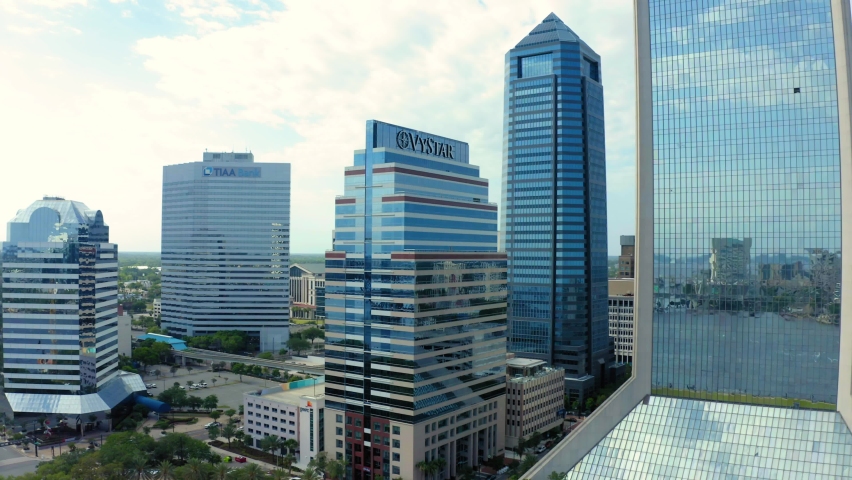 4K Aerial drone shot of downtown Jacksonville, Florida. Wide, tracking backward. 