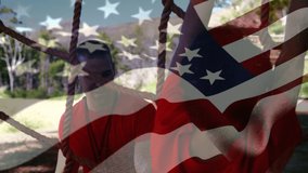 Animation of flag of usa over caucasian man and boy during obstacle race training. national sports, activity and patriotism concept digitally generated video.