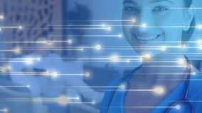Animation of spots over caucasian female doctor smiling. global medicine and digital interface concept digitally generated video. - Powered by Shutterstock - Get 15% off with code: PIKWIZARD15