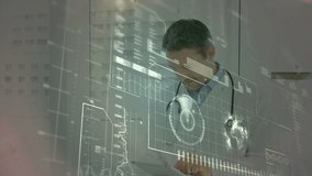 Animation of scientific data processing over caucasian male doctor using tablet. global medicine, science, research, data processing concept digitally generated video.