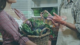 Animation of financial graphs over happy caucasian male seller and female customer in grocery shop. economy, finance, shopping and small independent business concept digitally generated video. - Powered by Shutterstock - Get 15% off with code: PIKWIZARD15