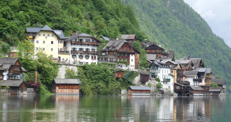 Hallstatt, Austria. Old houses on an alpine lake. | Shutterstock HD Video #1093282361