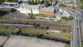 Beautiful Aerial Footage of Train on Tracks moving at Central Luton Railways Station of England Great Britain UK