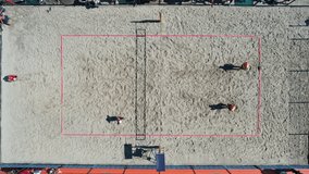 Top view of a beach volleyball practice on the sand. - Powered by Shutterstock - Get 15% off with code: PIKWIZARD15