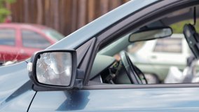Broken car after an accident. The body of a car is damaged in a severe car accident after a collision at the scene of an accident on a city street. The concept of road safety and insurance. - Powered by Shutterstock - Get 15% off with code: PIKWIZARD15