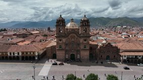 Establishing Aerial Fly Drone View of Cusco, Peru with chatedral and main square. High resolution 4k footage