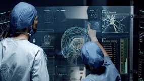 Professional Doctors Analyzing Human Brain Anatomy Scan on Futuristic Touch Screen Interface showing neurons, MRI scans, neural network activity and data. Concept: In the Near Future of Medicine - Powered by Shutterstock - Get 15% off with code: PIKWIZARD15