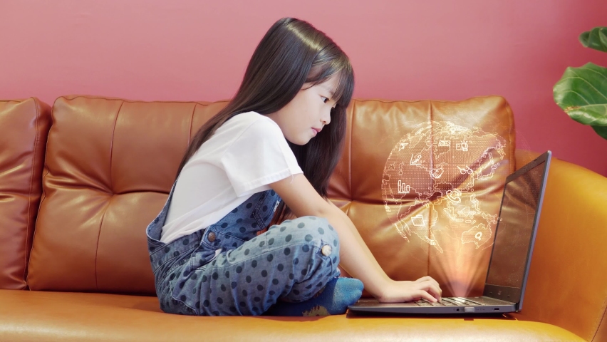 Kids girl using laptop PC. Education technology HUD concept . | Shutterstock HD Video #1093303963