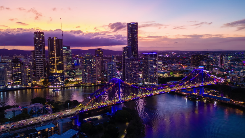Aerial hyperlapse, dronelapse video of Brisbane city in Australia at night Royalty-Free Stock Footage #1093306419